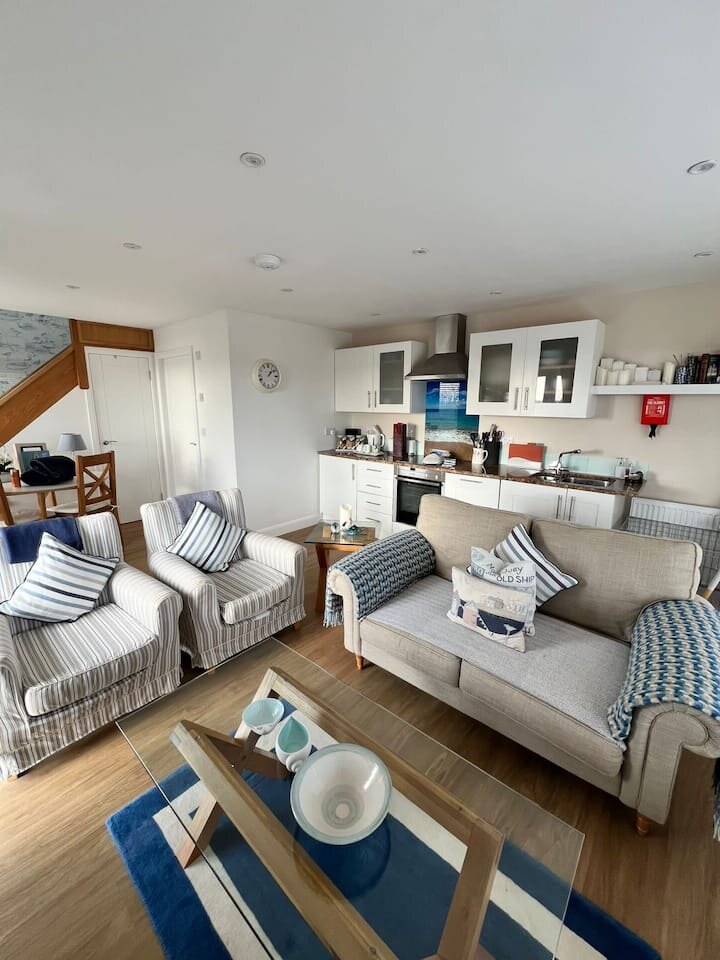Open-plan living room and kitchen in The Boat House