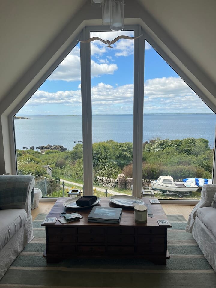 Fleet Bay framed by The Loft's cathedral window